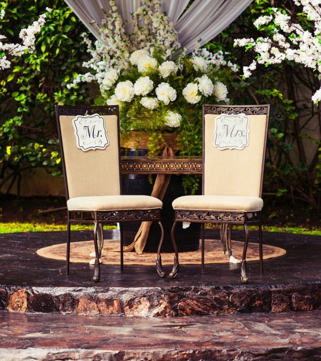 Photo by Guanfranco G two black steel chairs beside table
